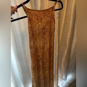 A yellow flowered girls dress